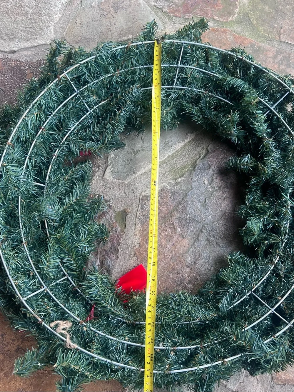 Festive Green Holiday Wreath with Red Bow and Poinsettias